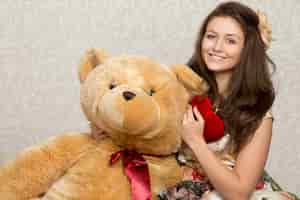 Free photo girl with teddy bear