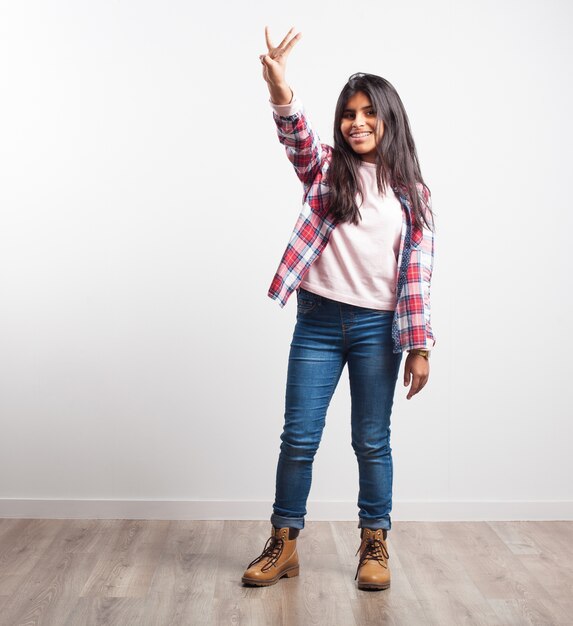 Girl with three raised fingers