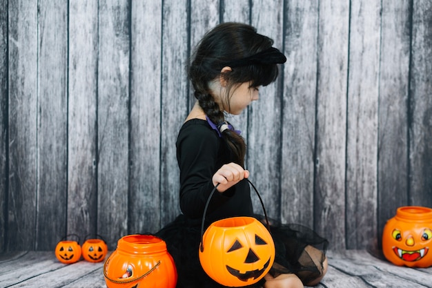 Girl with trick or treat basket