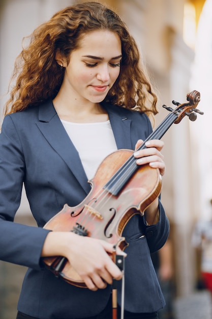 Free photo girl with violon