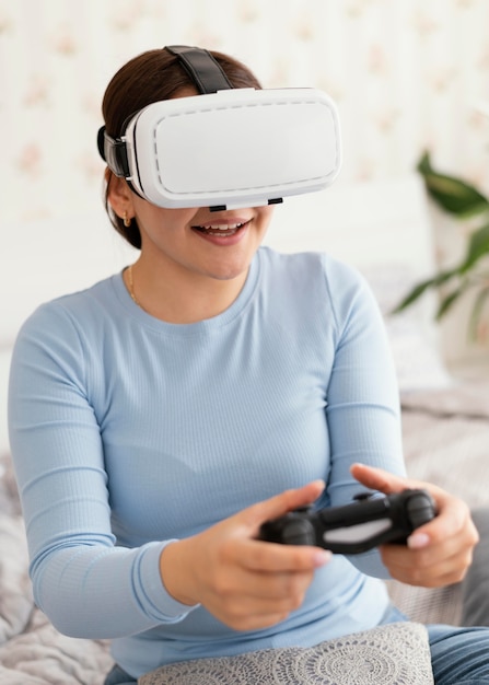 Girl with vr glasses and controller