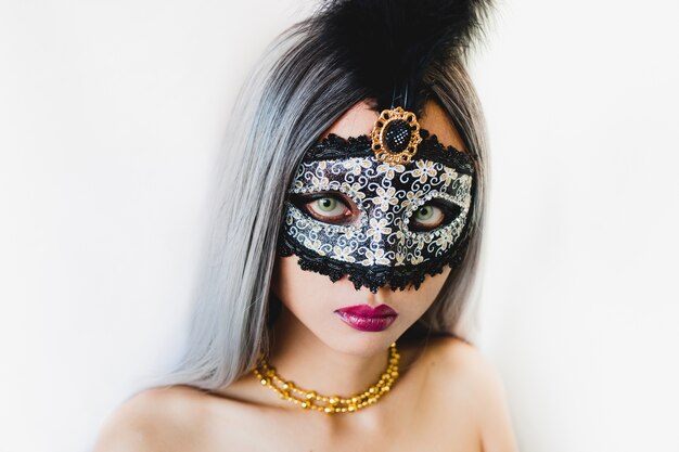 Girl with white hair with a venetian mask