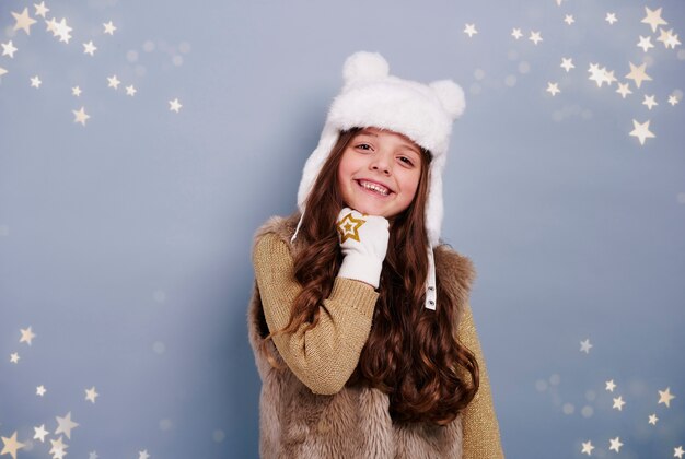 Girl with winter hat and glove 
