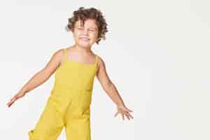 Free photo girl in a yellow jumpsuit