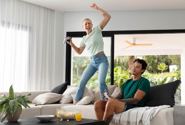 Free Photo  Girlfriend and boyfriend playing video games together