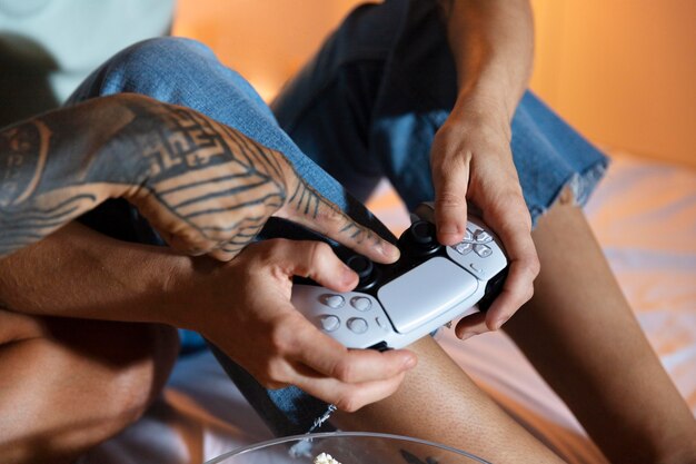 Girlfriend and boyfriend playing video games together at home