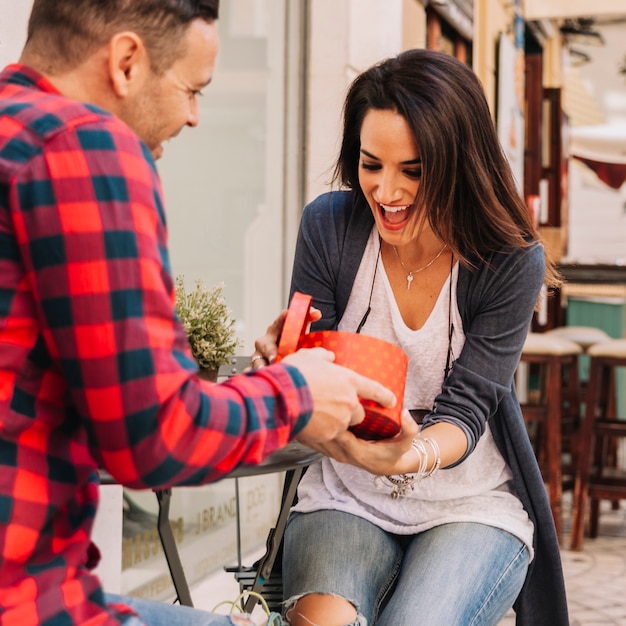 Girlfriend receiving present