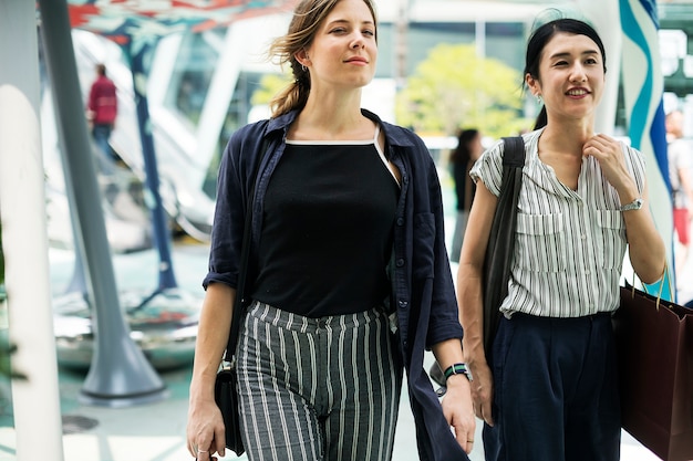 Girlfriends shopping around the city