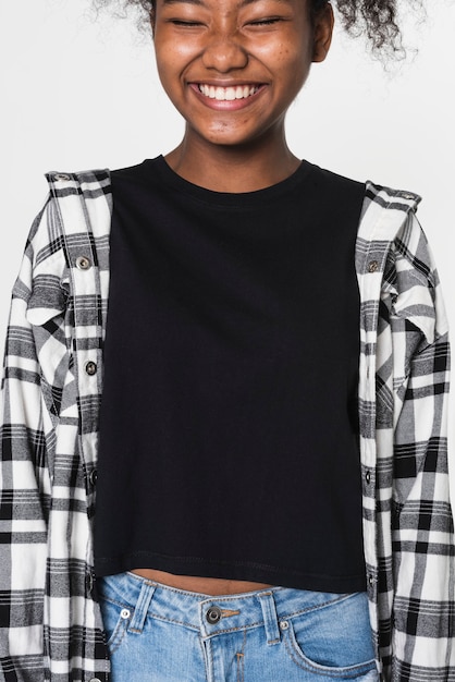 Free photo girls' black tank top with flannel shirt youth apparel with design space