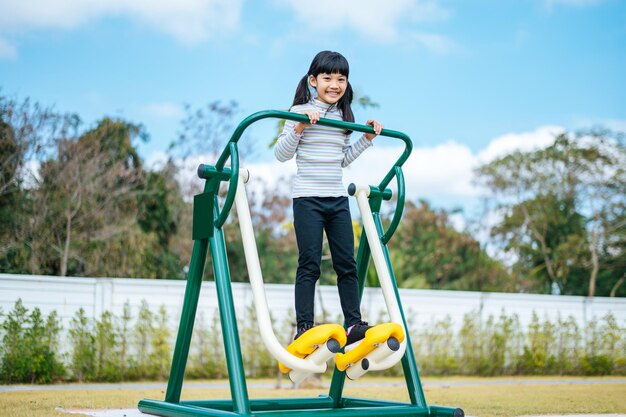 Girls exercising in the playground. Selective focus.