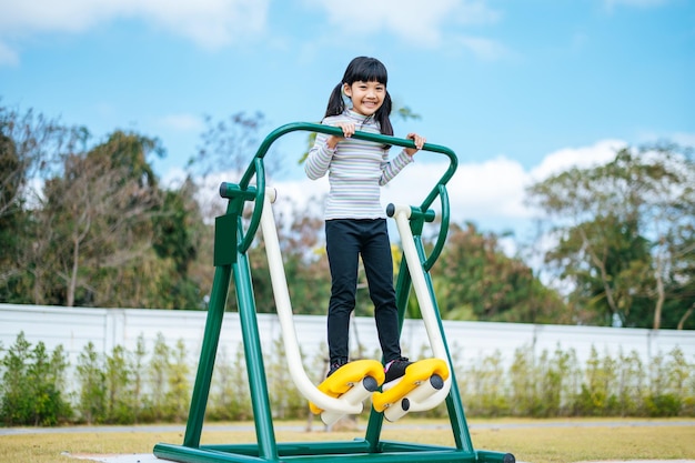 Girls exercising in the playground. Selective focus.