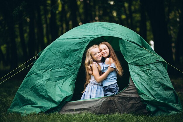 Girls friends in tent