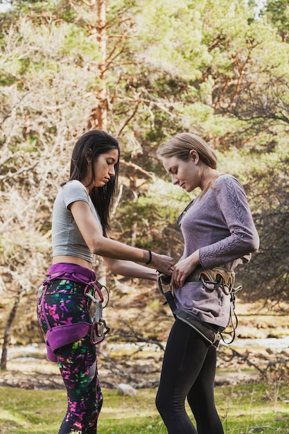 Girls getting ready to climb