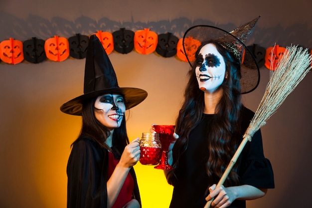 Free photo girls at a halloween party