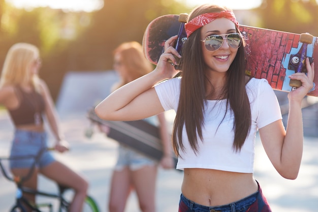 Girls having fun in skatepark