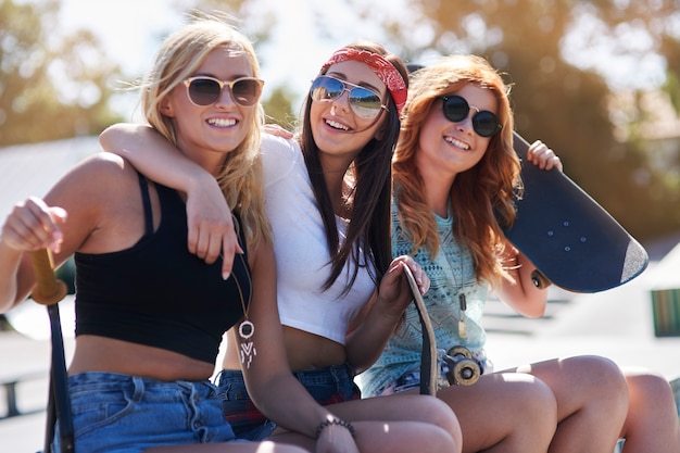 Girls having fun in skatepark