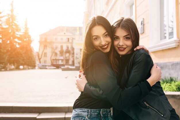 Girls hugging and smiling