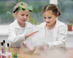 Free photo girls in lab doing experiments