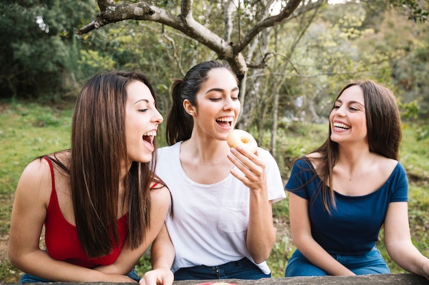 Girls laughing in park