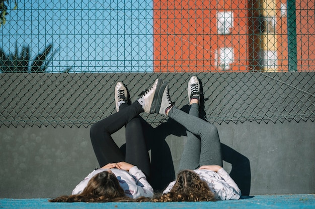 Girls lying on rooftop