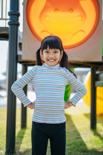 Free photo girls playing in the playground happily. selective foucs.