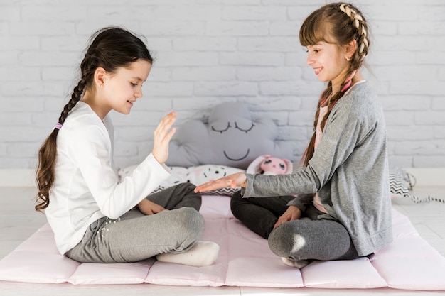 Free photo girls playing together