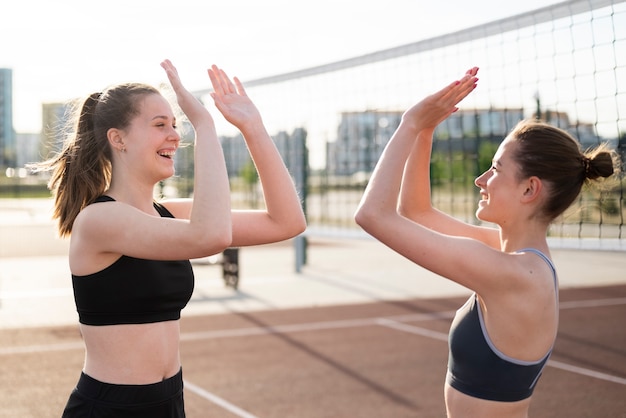 Girls playing volleyball