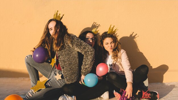 Girls playing with balloons