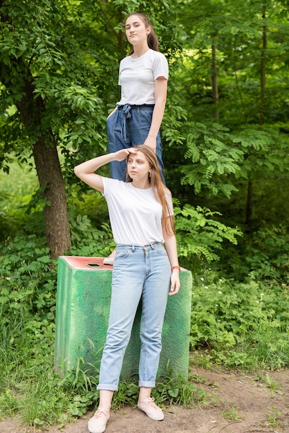 Girls posing for the camera outside