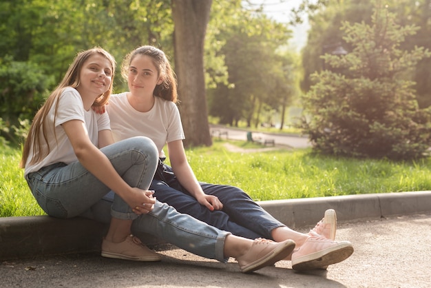 Girls sitting and looking at the camera