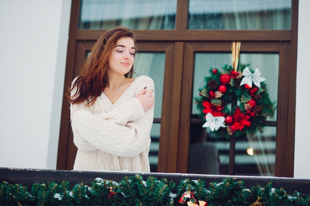 Free photo girls standing on a balcony