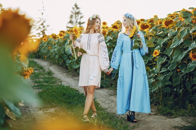 girls and sunflowers