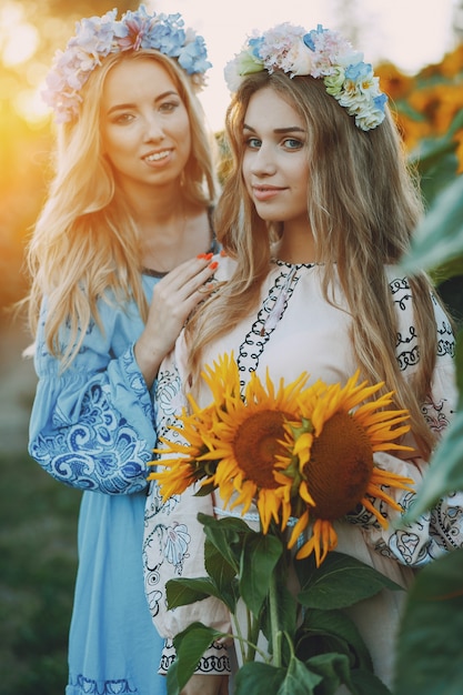 girls and sunflowers