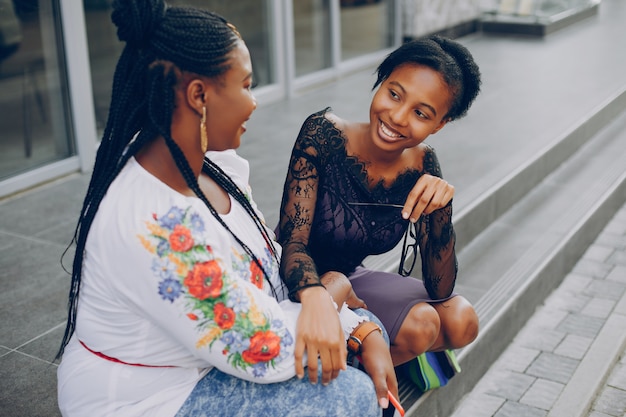 Girls walk along the streets of the city