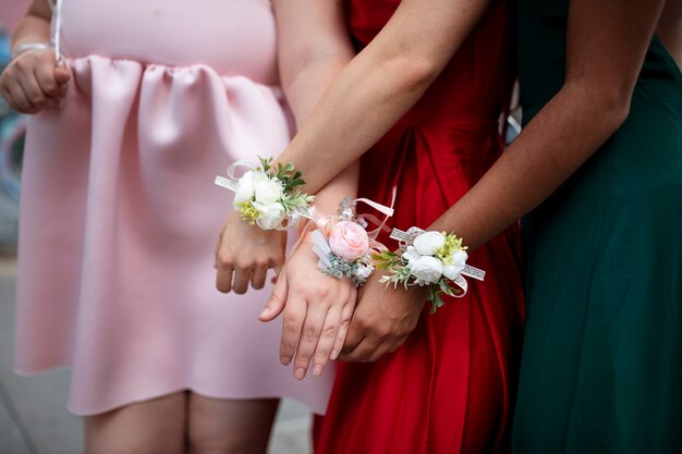 Girls wearing flower accessories at their prom