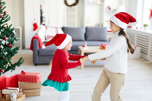 Girls whirling and dancing on christmas season