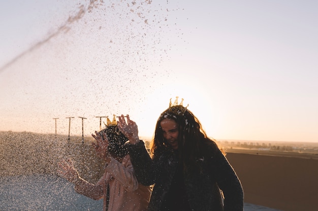 Girls under white foam