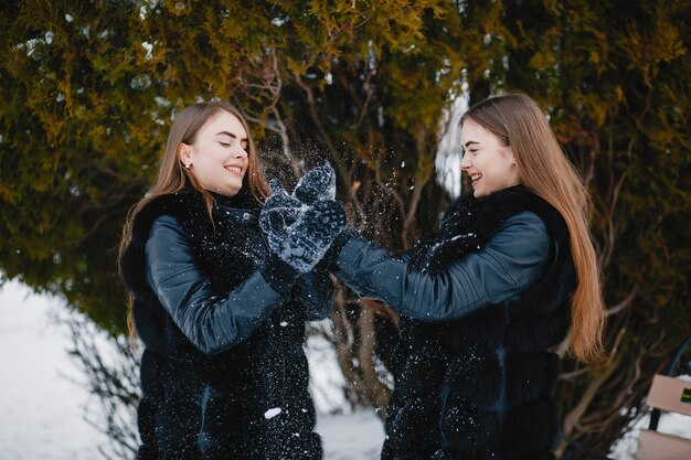 Girls in a winter park