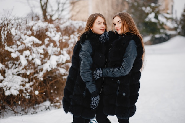 Girls in a winter park