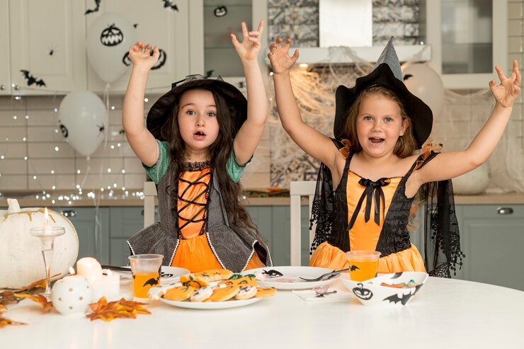 Free Photo girls in witch costume spooky concept