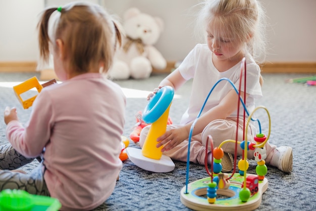 Girls with educational toys