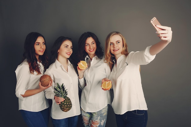 Free photo girls with fruit