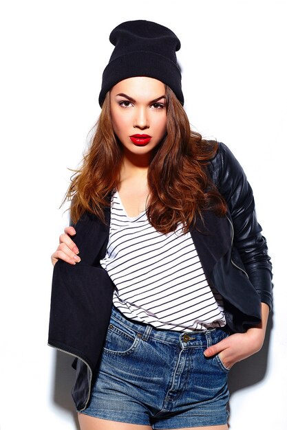 glamour stylish beautiful  young happy smiling woman model with red lips  in casual cloth in black beanie
