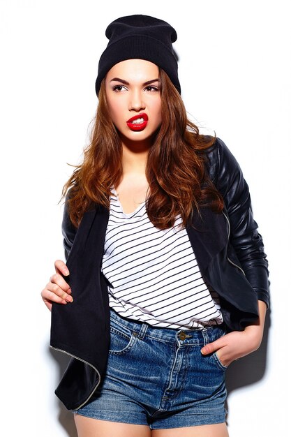 glamour stylish beautiful  young happy smiling woman model with red lips  in casual cloth in black beanie