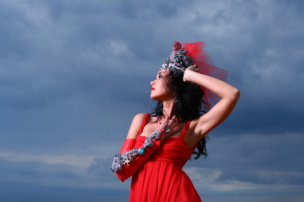 Free photo glamour woman with red dress