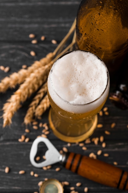 Glass of beer with foam top view