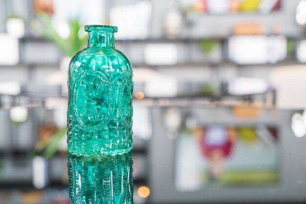 glass bottle decoration on the table