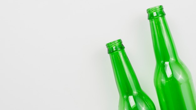 Glass bottles on grey background