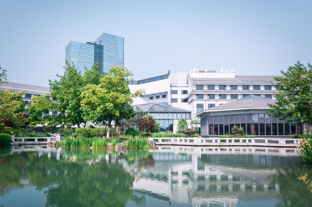 Glass buildings seen from a lake