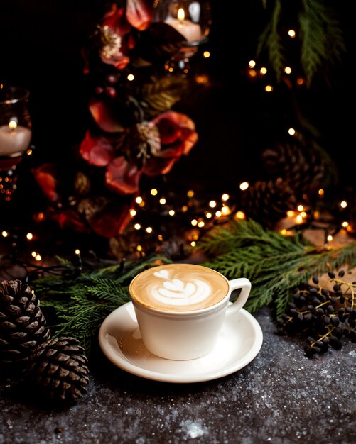 A glass of cappuccino on the table